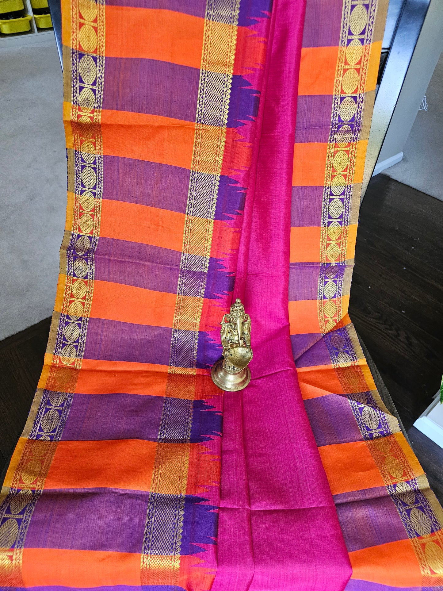 Pure Kanchi Pattu - Pink with orange and purple reeta peet borders