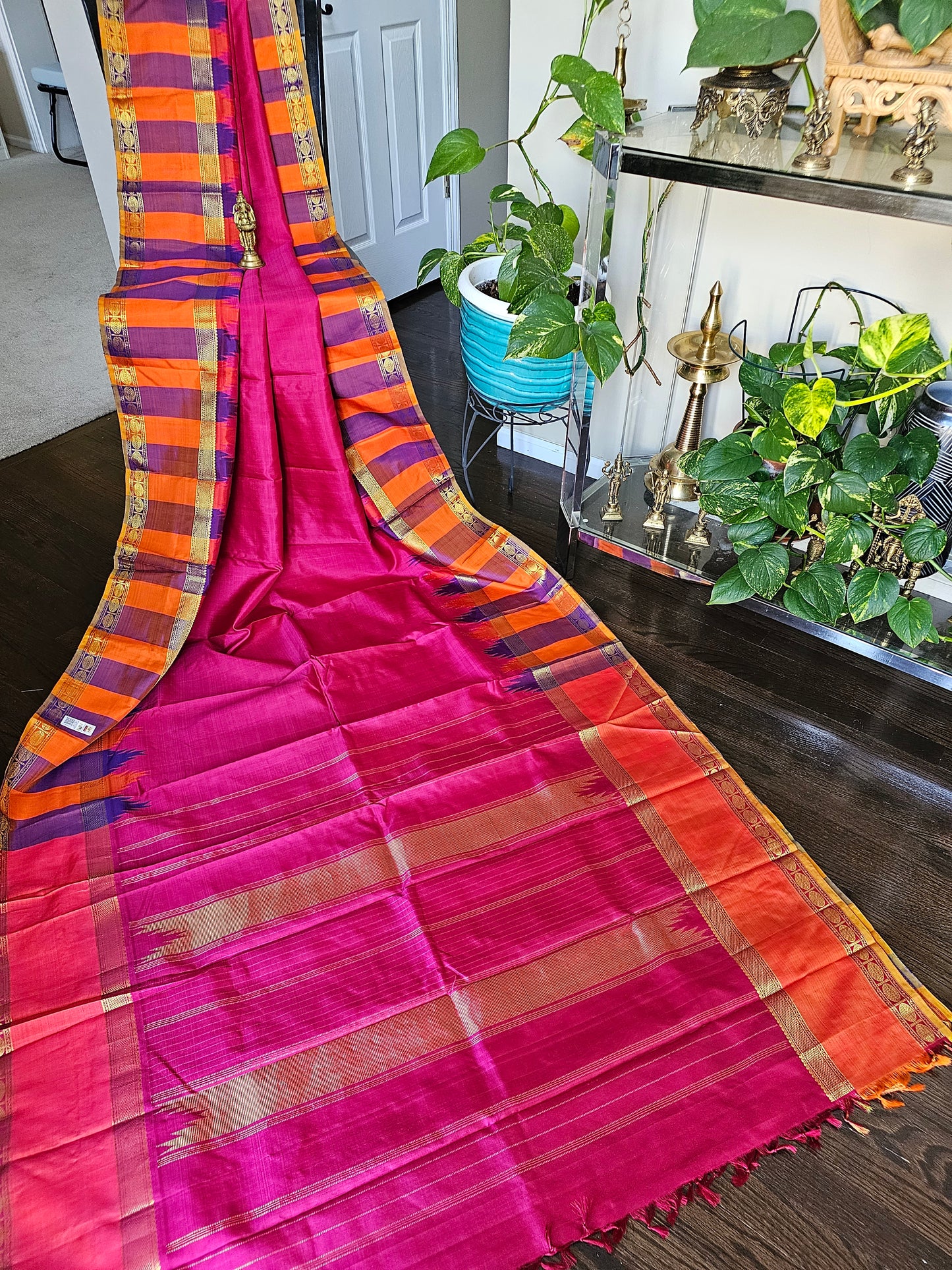 Pure Kanchi Pattu - Pink with orange and purple reeta peet borders