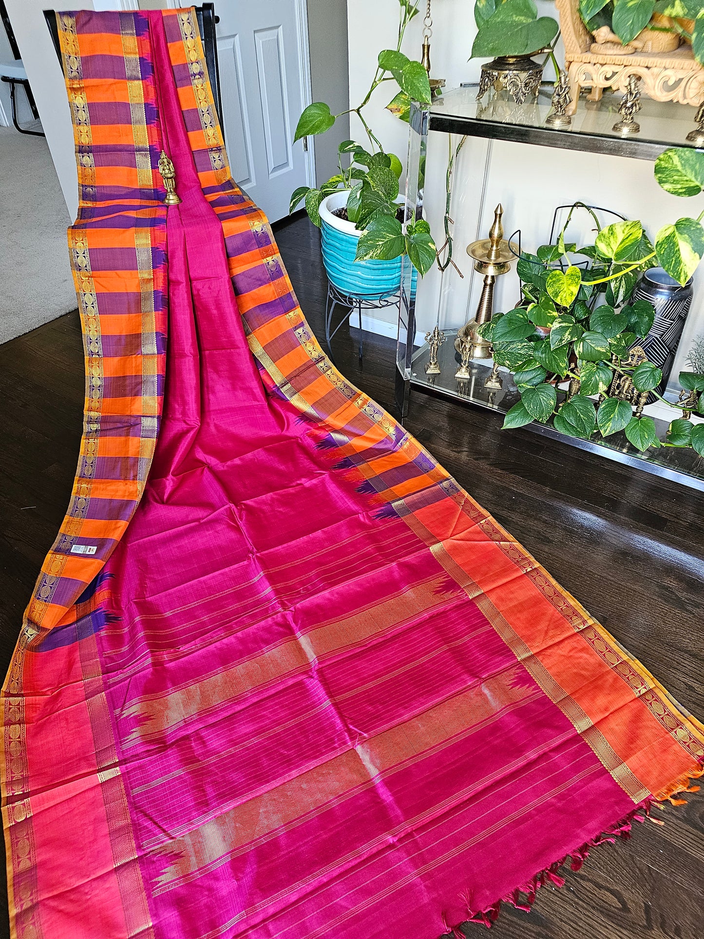 Pure Kanchi Pattu - Pink with orange and purple reeta peet borders