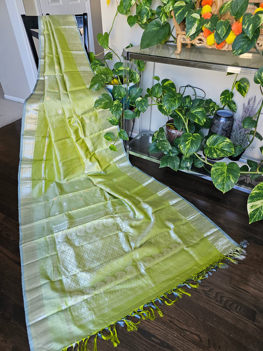a beautiful gadwal silk !!!!  Pastel shade green with silver combination is a great combination.